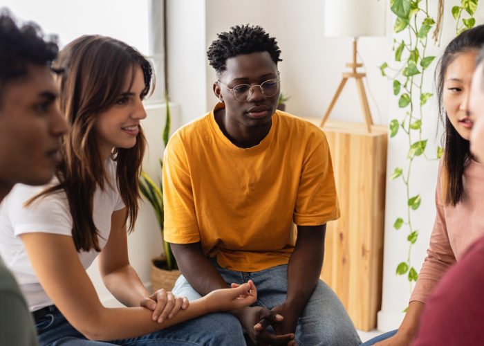 Multiracial,People,Sitting,In,Circle,During,Group,Therapy,Supporting,Each